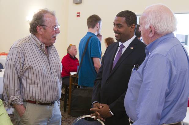Barry Duman, left, chats with Steven Horsford, candidate for state's 4th Congressional District, before a debate at Temple Sinai of Las Vegas in Summerlin Sunday, Oct. 14, 2012. The temple's Men's Club sponsored the debate.