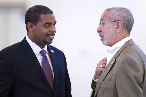 Steven Horsford, left, candidate for the state's 4th Congressional District, listens to Elliott Karp, president/CEO of the the Jewish Foundation of Las Vegas, before a debate with Danny Tarkanian at Temple Sinai of Las Vegas in Summerlin Sunday, Oct. 14, 2012. The temple's Men's Club sponsored the debate.