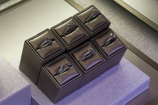 Diamond engagement rings are displayed at Tiffany and Co. in the Crystals retail mall Monday, Oct. 15, 2012. Prices for diamond engagement rings ranged from$1275.00 to $488, 500.00.