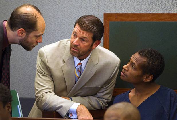 Noel Stevens listens to attorneys Dan Silverstein, left, and Curtis Brown at the Clark County Regional Justice Center Monday, Oct. 15, 2012. George Tiaffay, a City of Las Vegas firefighter, allegedly paid Stevens, a homeless man, to kill his estranged wife, then tried to commit suicide when suspicion turned toward him.