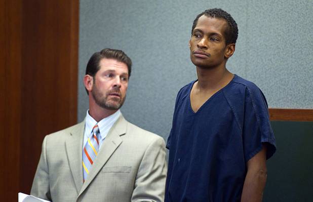 Noel Stevens stands in court at the Clark County Regional Justice Center Monday, Oct. 15, 2012. George Tiaffay, a City of Las Vegas firefighter, allegedly paid Stevens, a homeless man, to kill his estranged wife, then tried to commit suicide when suspicion turned toward him. Attorney Curtis Brown is at left.