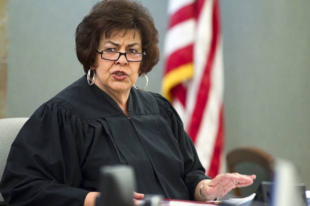 Justice of the Peace Deborah Lippis presides over an initial appearce by George Tiaffay and Noel Stevens at the Clark County Regional Justice Center Monday, Oct. 15, 2012. Tiaffay,a City of Las Vegas firefighter, allegedly paid Stevens, a homeless man, to kill his estranged wife, then tried to commit suicide when suspicion turned toward him.