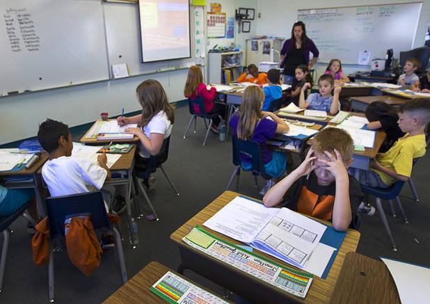 Third grader Jonathan Azbill works on a math problem at Lomie Heard Elementary School on Nellis Air Force Base Tuesday, Oct. 16, 2012. The school is the only Clark County school on a military base.
