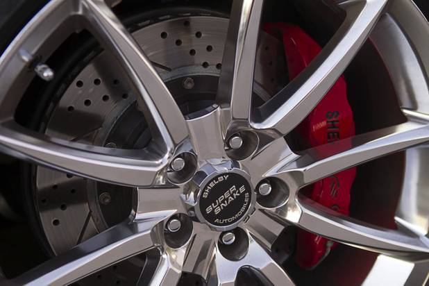 Shelby brakes with 14-inch rotors and six-piston calipers are shown behind a wheel on a 2007 Shelby GT500 Super Snake during a Breakfast Club of Automotive Enthusiasts weekly meeting at the T-Bird Restaurant and Lounge, 9465 South Eastern Avenue, Wednesday, Oct. 17, 2012.