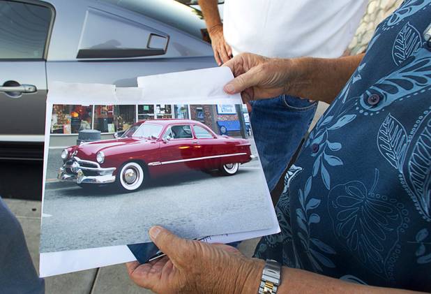 Larry Henrichsen holds a photo of his "new" car- a 1950 Ford coupe- before a Breakfast Club of Automotive Enthusiasts weekly meeting at the T-Bird Restaurant and Lounge, 9465 South Eastern Avenue, Wednesday, Oct. 17, 2012.