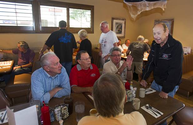 John Bergler, right, talks with members during a Breakfast Club of Automotive Enthusiasts weekly meeting at the T-Bird Restaurant and Lounge, 9465 South Eastern Avenue, Wednesday, Oct. 17, 2012.