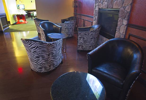 A seating area is shown near the bar in the Players Club, a bar-arcade at Stephanie Street and Paseo Verde Parkway, in Henderson Thursday, Oct. 18, 2012.