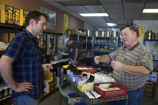 Owner Steve Berg, left, listens to customer David Cron at Vegas Homebrew & Winemaking, 5140 W. Charleston Blvd., Thursday, Oct. 18, 2012. Cron was asking for some technical advice on his beer-making equipment.