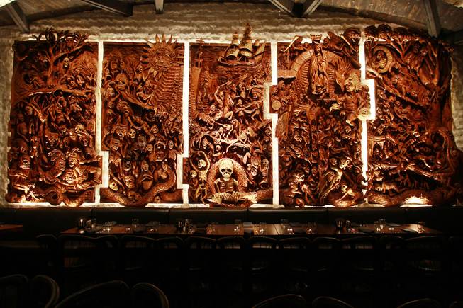 The chainsaw-carved wood panel at Javier's in Aria Oct. 18, 2012.