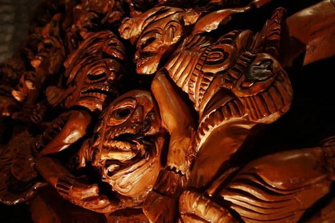 A detail of the chainsaw-carved wood panel at Javier's in Aria Oct. 18, 2012.