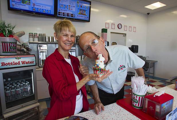Robin Dobbs holds a bowl of frozen custard as her husband Irving takes a bite at Rita's Green Valley, a custard and Italian ice shop in Henderson, Sunday, Oct. 21, 2012. Rita's, on Stephanie Street just north of Sunset Road, is the first Nevada franchise of a popular East Coast chain that originated in Bensalem Township, Penn.