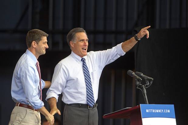 Republican vice presidential candidate Paul Ryan, left, introduces presidential candidate Mitt Romney during a campaign rally at the Henderson Pavilion Tuesday, Oct. 23, 2012.