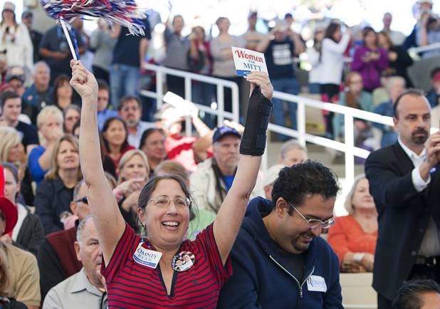 A woman cheers for Republican candidates during a campaign rally at the Henderson Pavilion Tuesday, Oct. 23, 2012.