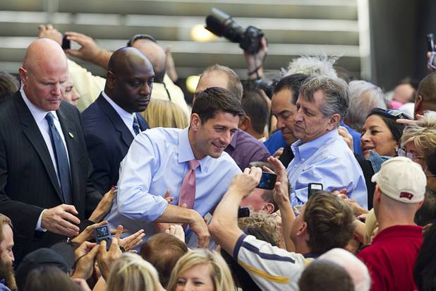 Republican vice presidential candidate Paul Ryan poses for a photo during a campaign rally at the Henderson Pavilion Tuesday, Oct. 23, 2012.