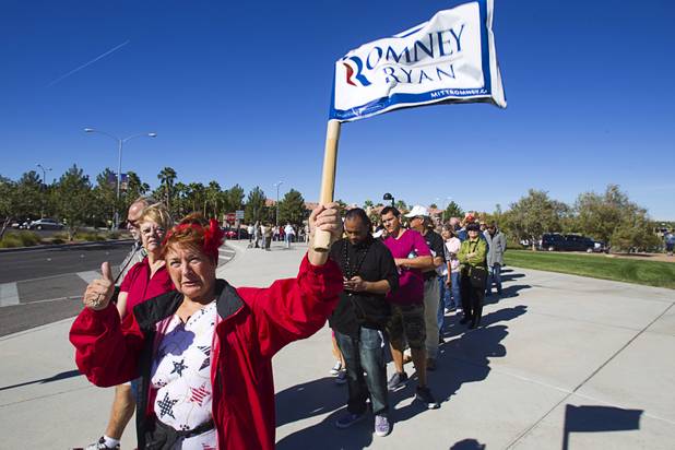 Jean Nelson of Henderson gives a thumbs-up as she waits in line for the Mitt Romney-Paul Ryan campaign rally at the Henderson Pavilion Tuesday, Oct. 23, 2012.