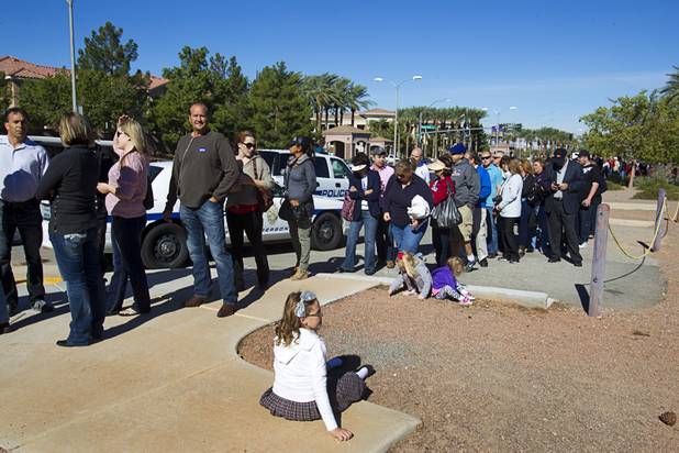 Romney supporters wait in line for the Mitt Romney-Paul Ryan campaign rally at the Henderson Pavilion Tuesday, Oct. 23, 2012.