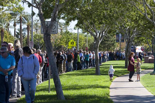 Romney supporters wait in line for the Mitt Romney-Paul Ryan campaign rally at the Henderson Pavilion Tuesday, Oct. 23, 2012.
