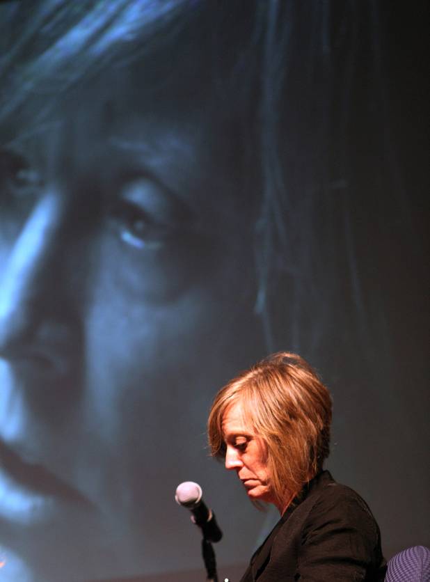 Andrea Swanson, the parent of a sex trafficking victim, listens ...