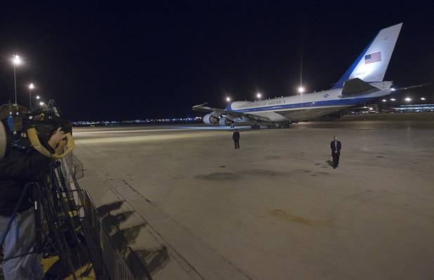 Air Force One taxis to a runway at McCarran International Airport after President Barack Obama's campaign rally in Las Vegas Wednesday, Oct. 24, 2012.
