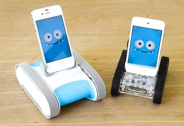 A new Romo smartphone robot is shown next to the classic model at the Romotive offices in downtown Las Vegas Wednesday, Oct. 24, 2012. The new Romo with enhanced features can be ordered on kickstarter.com and is featured in the Neiman Marcus Holiday catalog.