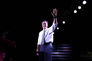 Republican presidential candidate, former Massachusetts Gov. Mitt Romney takes the stage at an election campaign rally at the Reno Event Center in Reno, Nev., Wednesday, Oct. 24, 2012. 