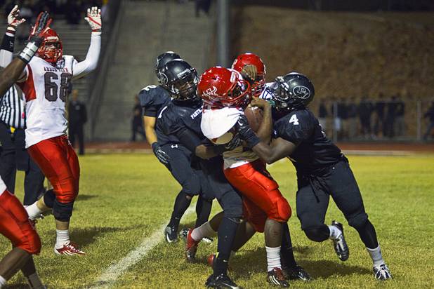 Arbor View's Jimmie Finister muscles his way into the end zone for Arbor View's first touch down against Palo Verde Thursday, Oct. 25, 2012. Arbor View beat Palo Verde 35-29.