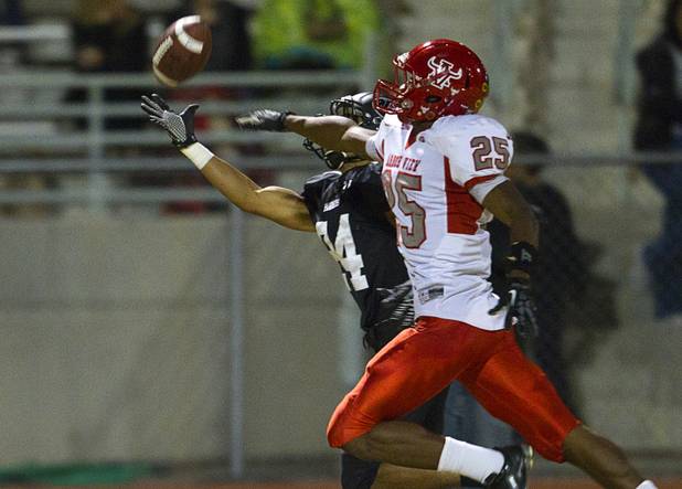 Arbor View's Jacob Parker breaks up a pass intended for Palo Verde's Ryan Beaulieu Thursday, Oct. 25, 2012. Arbor View beat Palo Verde 35-29.