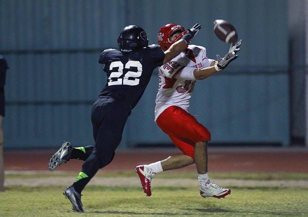 Palo Verde's Calvin Beaulieu breaks up a pass intended for Arbor View's Anthony Sutton Thursday, Oct. 25, 2012. Arbor View beat Palo Verde 35-29.