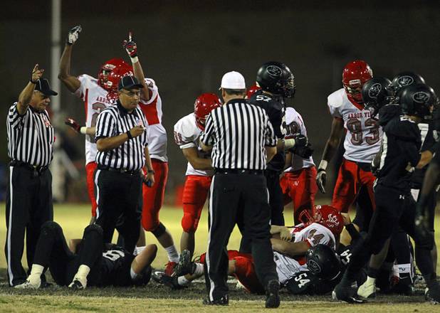 Arbor View players celebrate after regaining possession of the ball with an onside kick against Palo Verde Thursday, Oct. 25, 2012. Arbor View beat Palo Verde 35-29.