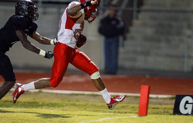 Arbor View's Jacob Speaks crosses the goal line for the winning touchdown against Palo Verde Thursday, Oct. 25, 2012. Arbor View beat Palo Verde 35-29.