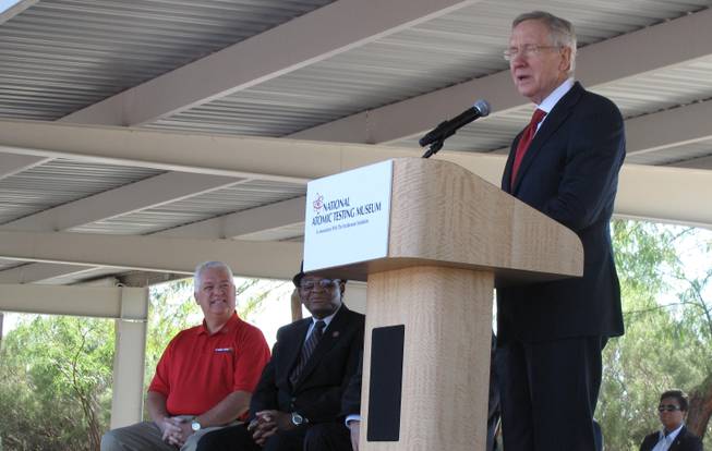 U.S. Sen. Harry Reid, right, speaks at the dedication ceremony of the National Atomic Testing Museum on Friday, Oct. 26. Watching on are Kevin Fitzgerald of the Cold War Patriots, left, and Bishop Sylvester Hooks.