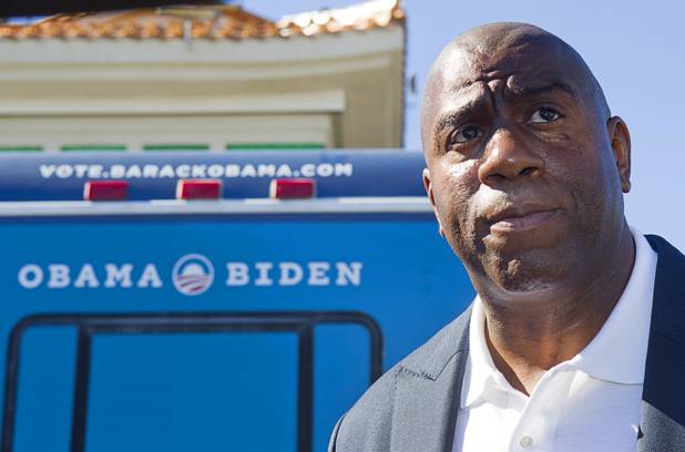 Basketball legend Earvin "Magic" Johnson campaigns for President Obama during an Asian American and Pacific Islander early voting rally at the Chinatown Mall on Saturday, Oct. 27, 2012.
