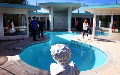 Patrons tour a home that is for sale on Spencer Street in the Paradise Palms neighborhood during a mid-century modern bus tour of homes in Las Vegas on Sunday, October 28, 2012.