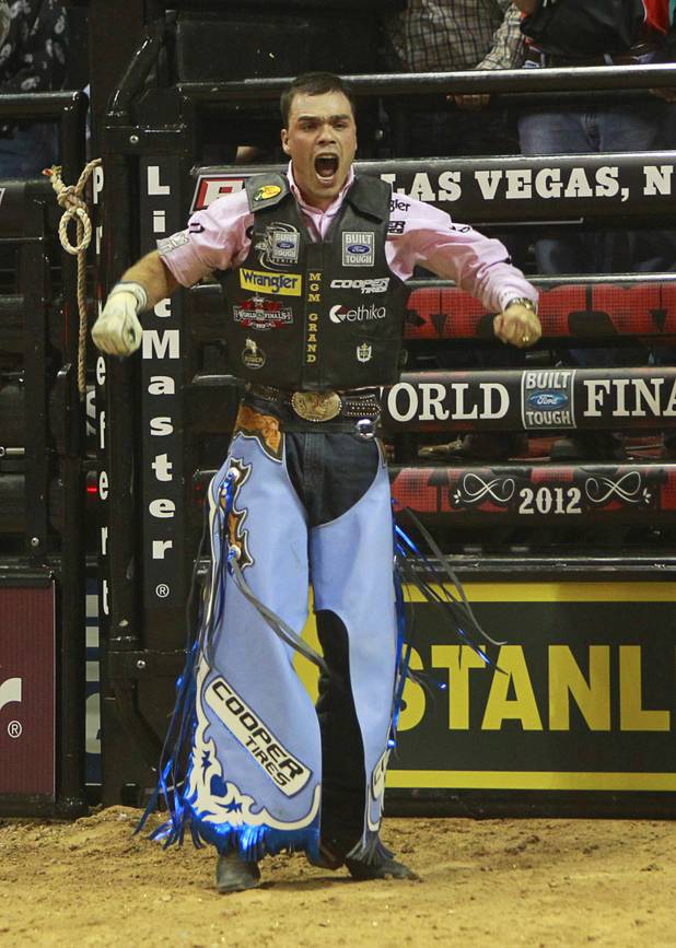 Brazilian bull rider Emilio Resende celebrates after a successful ride during the Built Ford Tough Series Professional Bull Riders (PBR) World Finals at the Thomas & Mack Center Sunday, Oct. 28, 2012. Resende was later named as Rookie of the Year.
