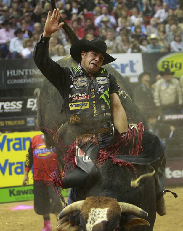 Brazilian bull rider Robson Palmero competes during the Built Ford Tough Series Professional Bull Riders (PBR) World Finals at the Thomas & Mack Center Sunday, Oct. 28, 2012. Palmero was the event champion and Brazilian Silvano Alves won the series championship.