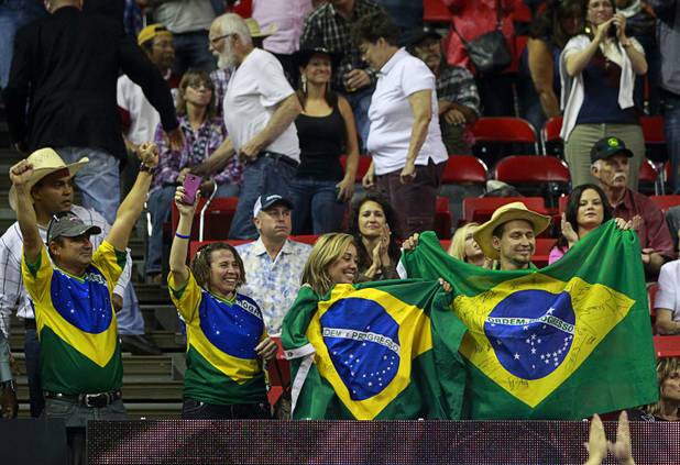 Brazilian fans celebrate as Silvano Alves of Brazil wins the series championship during the Built Ford Tough Series Professional Bull Riders (PBR) World Finals at the Thomas & Mack Center Sunday, Oct. 28, 2012. 
