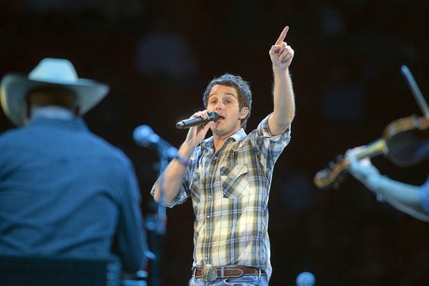 Country singer Easton Corbin performs before the bull riding competition during the Built Ford Tough Series Professional Bull Riders (PBR) World Finals at the Thomas & Mack Center Sunday, Oct. 28, 2012. 