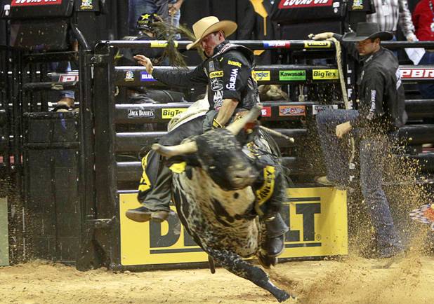 Kody Lostroh of Longmont, Colo. competes during the Built Ford Tough Series Professional Bull Riders (PBR) World Finals at the Thomas & Mack Center Sunday, Oct. 28, 2012.