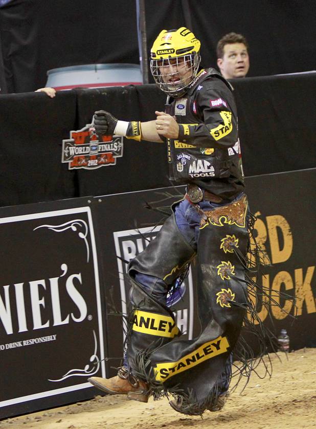 Silvano Alves of Brazil celebrates a successful ride during the Built Ford Tough Series Professional Bull Riders (PBR) World Finals at the Thomas & Mack Center Sunday, Oct. 28, 2012. Alves won the series championship becoming the first rider to win back-to-back series titles in PBR.