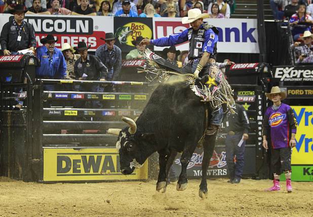 Renato Nunes of Brazil competes during the Built Ford Tough Series Professional Bull Riders (PBR) World Finals at the Thomas & Mack Center Sunday, Oct. 28, 2012.