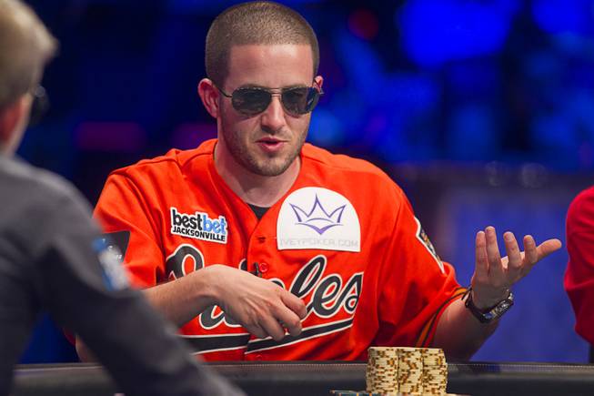Greg Merson, right, stacks chips during the World Series of Poker Main Event final table at the Rio on Monday, Oct. 29, 2012. 