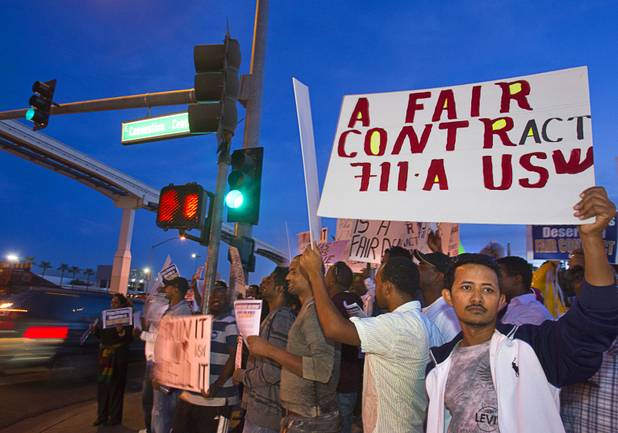 Cab drivers hold an informational picket at the intersection of Convention Center Drive and Paradise Road in front of the Las Vegas Convention Center Wednesday, October 31, 2012. The drivers' unions are in a contract dispute with Frias Transportation and disagree with proposed changes in the companys seniority policies. They also say the company does not pay drivers fair wages.