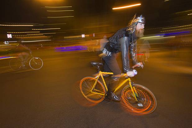 A cyclist participates in the third annual Halloween Parade in downtown Las Vegas Wednesday, October 31, 2012.