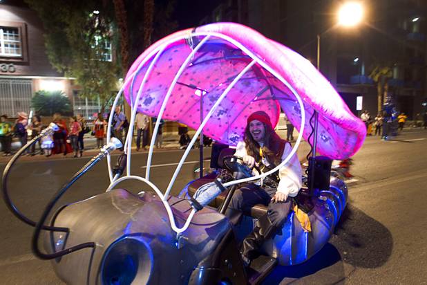 Gordon Katz drives a Lady Buggie during third annual Halloween Parade in downtown Las Vegas Wednesday, October 31, 2012.