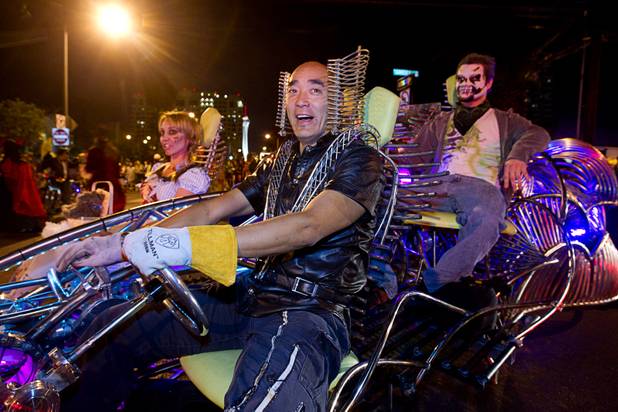 Henry Chang drives the "Mr. Fusion" vehicle during the third annual Halloween Parade  in downtown Las Vegas Wednesday, October 31, 2012.