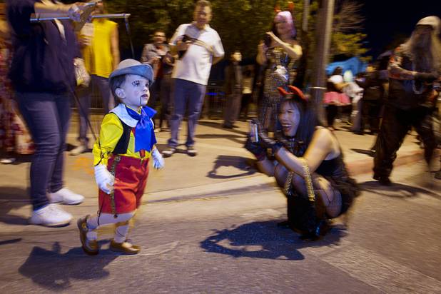 Jaden Brittell, 2, dressed as Pinocchio, prepares to walk in the third annual Halloween Parade  in downtown Las Vegas Wednesday, October 31, 2012.