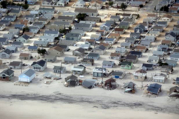 The view of storm damage over the Atlantic Coast in Seaside Heights, N.J.,  Wednesday, Oct. 31, 2012, from a helicopter traveling behind the helicopter carrying President Obama and New Jersey Gov. Chris Christie, as they viewed storm damage from superstorm Sandy.   (AP Photo/Doug Mills, Pool)