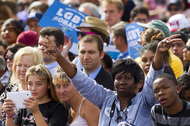 Supporters of President Barack Obama listen to entertainer Sheila E. before a campaign rally at the Cheyenne Sports Complex near the College of Southern Nevada in North Las Vegas Thursday, Nov. 1, 2012.