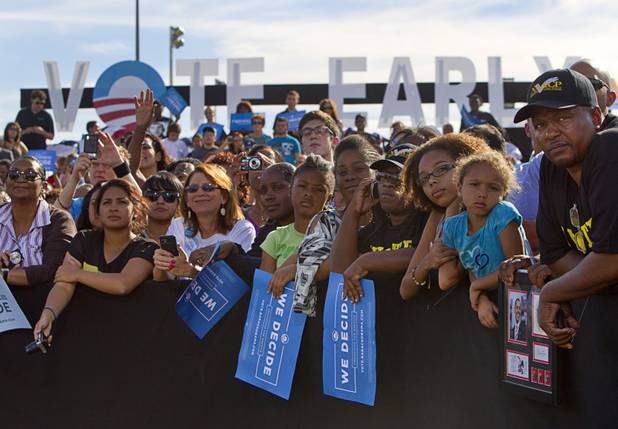 Supporters listen to President Barack Obama during at a campaign rally at the Cheyenne Sports Complex near the College of Southern Nevada in North Las Vegas Thursday, Nov. 1, 2012.