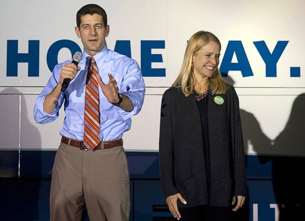 Republican vice presidential candidate Paul Ryan speaks to supporters during a campaign stop in Las Vegas Thursday Nov. 1, 2012. Ryan's wife Janna is at right.